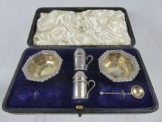 A Boxed Set of Silver Salt and Pepper, Birmingham hallmark, spoon missing, mm STS, together with a