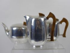 A Vintage Three Piece Picquot Tea Set, including two tea pots and a coffee pot.