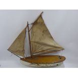 A Mid 19th Century Pond Yacht, timber hull and linen sails, (would benefit from restoration).