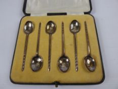 A Set of Six Solid Silver Coffee Spoons, Sheffield hallmark dd 1935 mm Walker & Hall together with