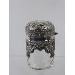 A Large Cut Glass and Silver Topped Vanity Jar, London hallmark, dated 1921, with the original