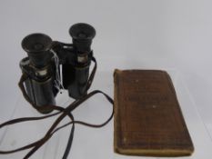 A Pair of WWI Binoculars, together with a Bacon's Motoring & Cycling Map of Cheltenham and