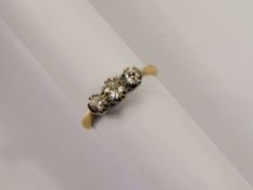 A Lady's Antique 18 ct Yellow Gold and Platinum Three Stone Diamond Ring, size M, 40 to 45 pts old