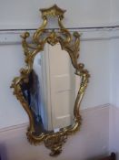 An Ornate Gilt Wood Hall Mirror, approx 100 x 54 cms.