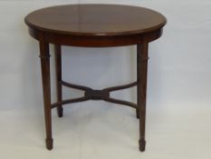 Mahogany Oval Occasional Table, inlaid with tapered legs and stretchers, approx 75 x 52 x 73 cms
