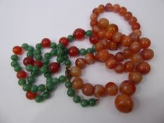 A Green and Orange Agate Bead Necklace, on silver clasp, approx 68 cms together with another part