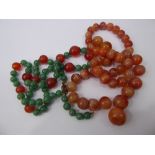 A Green and Orange Agate Bead Necklace, on silver clasp, approx 68 cms together with another part