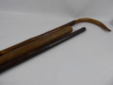 An Antique Shepherd's Crook Style Walking Stick, together with a leather covered swagger stick and