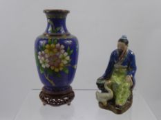 A Chinese Cloisonne Vase, together with a ceramic painted figure of a man and his goose. (2)