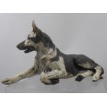 A Ceramic Sculpture of a Seated Alsatian, K. Pudge, approx 30 x 20 cms.