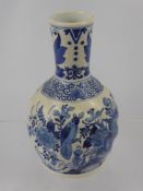 A Dutch Delft Blue and White Vase, mm KB and further incised marks, approx 22 cms, hand painted with