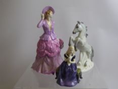 Miscellaneous Porcelain, a figurine signed E J Hartwell a Grey Dapple Rocking Horse signed E J