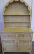 A Painted Oak Cottage Dresser, two short drawers with cupboards beneath and two display shelves