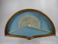 A Fine 19th Century Chinese Carved Ivory Brisé Fan, long handled guard carved with foliate motif,