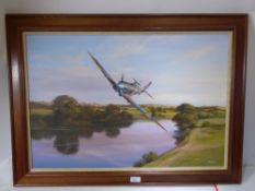 J. Whitehouse, an original oil on canvas depicting a Spitfire, approx 73 x 49 cms framed.