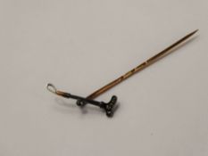 An Antique Rose Cut Diamond and Gold Tie Pin, in the form of a riding crop, approx 1.3 gms