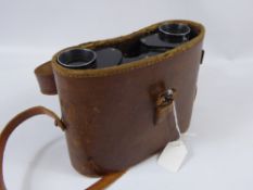 A Pair of Dollond of London x 8 Trismatic Binoculars, in original leather case.