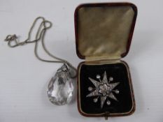 A Lady's Silver Metal and Glass Drop Pendant, on chain together with a costume jewellery paste