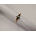 A Lady's 18 ct Yellow Gold and Platinum Diamond Solitaire, approx 1.6 gms, size J, diamond is 15