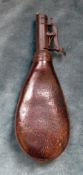 An Antique Leather Shot Pouch, with adjustable nozzle.