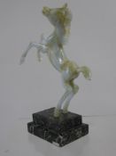 Istvan Komaromy Glass Figure of a Foal, raised on a green marble plinth bearing label, to lower