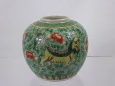 A Chinese Famille Rose Ginger Jar, decorated with guardian lions amongst chrysanthemum.