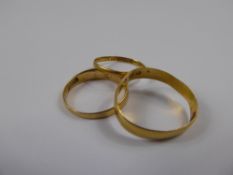 Two 22 ct Gold Wedding Bands, approx 2.7 gms together with a 18 ct gold and seed pearl ring (af),