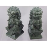 A Pair of Soap Stone Oriental Carvings, in the form of guardian lions, approx 21 cms