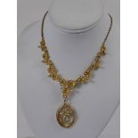 A Lady's 15 ct Yellow Gold Edwardian Seed Pearl Necklace, the necklace of graduated leaf form design