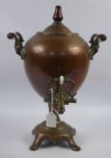 A 19th Century Copper Samovar, in original condition with porcelain handles and brass pouring spout,