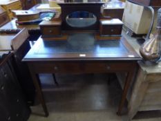 An Edwardian Mahogany Inlaid Writing Desk. The desk having tooled leather top with mirrored gallery,