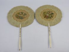 A Pair of Victorian Ivory and Paper Face Screens, with layer upon layer of of decorative paper