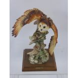 Giuseppe Armani Barn Owl Figurine, on an oak plinth, approx 23 cms high.