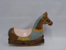 A Contemporary Hand Painted Carved Wooden Child's Floor Rocking Horse, approx 70 x 60 cms.