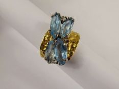 A Lady's 18 ct Bespoke Yellow Gold, Aquamarine and Diamond Butterfly Ring. The ring having a bark