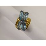 A Lady's 18 ct Bespoke Yellow Gold, Aquamarine and Diamond Butterfly Ring. The ring having a bark