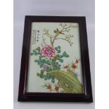 A Chinese Decorative Ceramic Tile, hand painted with tree peony and birds, signed upper left, in a