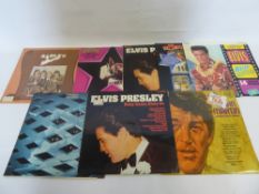A Miscellaneous Collection of Records, Both 33.1/3 and 45 rpm, including Elvis, The Monkees, Brian