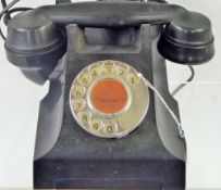 A Vintage circa 1950's Rotary Dial Telephone.