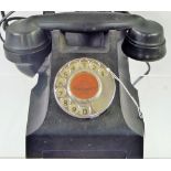 A Vintage circa 1950's Rotary Dial Telephone.