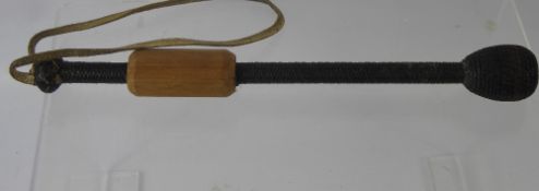 An Antique Naval Cosh/Persuader, made with whale baleen, with a turned wooden grip.