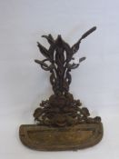 A 19th Century Cast Iron Umbrella Stand, with floral and bulrush design, kite mark to base, possibly