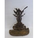 A 19th Century Cast Iron Umbrella Stand, with floral and bulrush design, kite mark to base, possibly