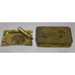 A WWI Brass Christmas 1914 Chocolate Box, together with a trench art ashtray. (2)