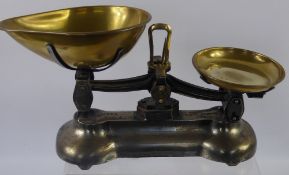 A Set of Libra Scale Co Vintage Kitchen Scales, with a small quantity of weights.