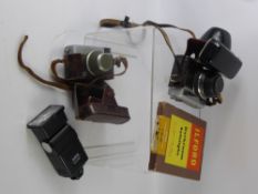 A Miscellaneous Collection of Cameras and Camera Equipment, including a Cullmann 41 camera stand, an