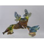 A Quantity of Royal Worcester Bird Figurines, including Beswick Green Finch nr 2105, Gold Finch nr