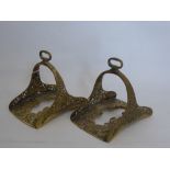 A Pair Antique of North African Brass Boot Stirrups, of pierced foliate design.