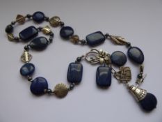 A Lapis Lazuli beaded necklace, approx 16.5 x 12 cms.