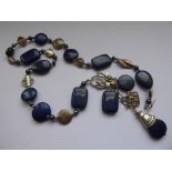 A Lapis Lazuli beaded necklace, approx 16.5 x 12 cms.